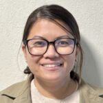 Portrait of a smiling woman in glasses